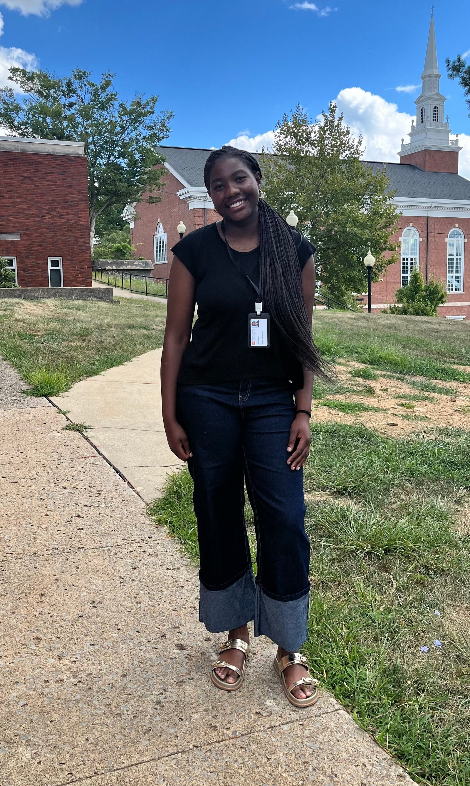 Celeste Ropafadzo Matsaudza standing on her university campus.